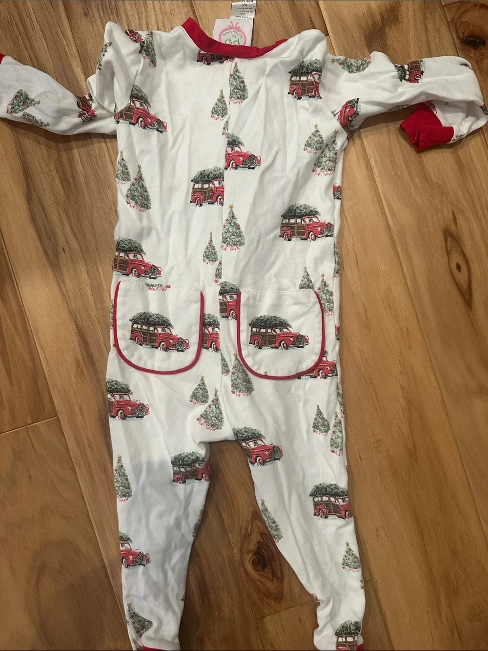 Kids Holiday One-Piece Pajama White with Red Truck Print by Posh Pickle Company